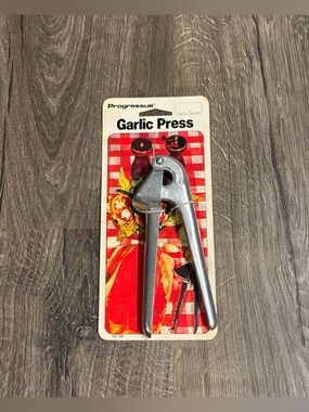 Vintage Progressus Garlic Press Silver Stainless Steel Crusher NEW NEVER USED